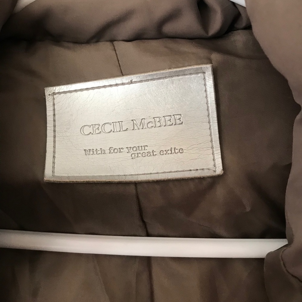 Cecil McBee down jacket with raccoon fur hood